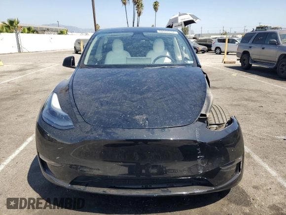 2022 Tesla Model Y Performance with VIN 7SAYGDEF4NF436834, listed as a Copart auction lot 68992234 with 22,171 mi miles and Salvage title. Bid and sale history available at DreamBid. Image 5.
