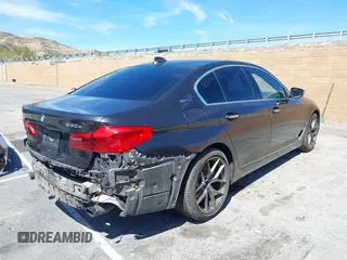 2018 BMW 5 Series 530e xDrive with VIN WBAJB1C58JB085443, listed as a IAAI auction lot 41856298 with 93,110 mi miles and . Bid and sale history available at DreamBid. Image 4.