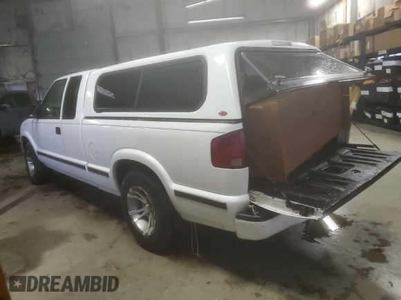 2001 GMC Sonoma SLS 1SG z VIN 1GTCS19W818228836, wystawiony jako Copart lot #85732914 z przebiegiem Nie podano mil oraz Tytuł czysty. Historia ofert i sprzedaży dostępna na DreamBid. Obrazek 2.