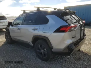 2021 Toyota RAV4 Hybrid XSE with VIN 4T3E6RFV1MU057403, listed as a Copart auction lot 47809415 with 56,570 mi miles and Salvage Title. Bid and sale history available at carsss.com. Image 2.