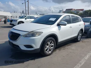 2015 Mazda CX-9 Sport with VIN JM3TB2BAXF0453244, listed as a IAAI auction lot 41905847 with 128,764 mi miles and . Bid and sale history available at carsss.com. Image 17.