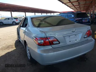 2002 Lexus ES 300 z VIN JTHBF30G220077671, wystawiony jako IAAI lot #42084128 z przebiegiem 143 975 mil mil oraz . Historia ofert i sprzedaży dostępna na DreamBid. Obrazek 13.