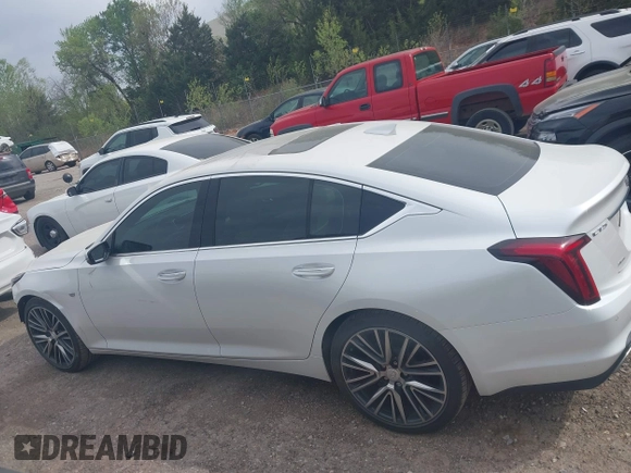 2024 Cadillac CT5 Premium Luxury z VIN 1G6DT5RW3R0129279, wystawiony jako IAAI lot #42011369 z przebiegiem 5 477 mil mil oraz . Historia ofert i sprzedaży dostępna na DreamBid. Obrazek 15.