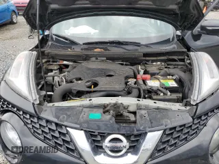 2015 Nissan Juke SL z VIN JN8AF5MV9FT551674, wystawiony jako Copart lot #50663085 z przebiegiem 110 805 mil mil oraz Szkody całkowita. Historia ofert i sprzedaży dostępna na DreamBid. Obrazek 11.