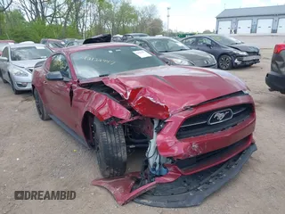 2015 Ford Mustang EcoBoost z VIN 1FA6P8TH1F5399086, wystawiony jako IAAI lot #42122957 z przebiegiem 131 325 mil mil oraz . Historia ofert i sprzedaży dostępna na DreamBid. Obrazek 1.