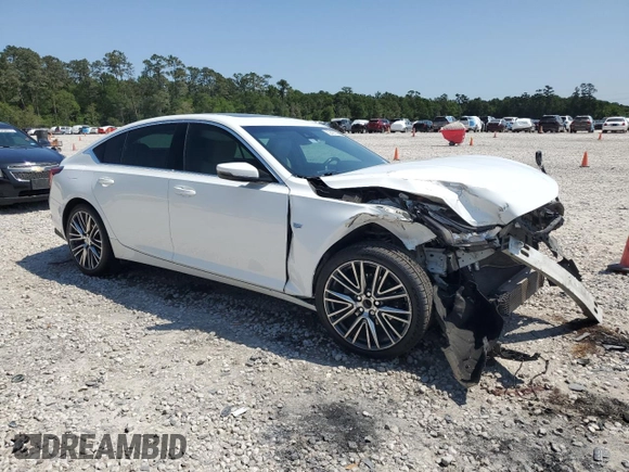 2021 Cadillac CT5 Luxury with VIN 1G6DW5RKXM0112301, listed as a Copart auction lot 52497035 with 69,261 mi miles and Salvage title. Bid and sale history available at DreamBid. Image 4.