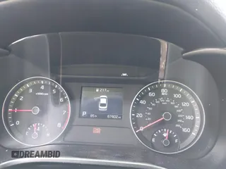 2019 Kia Forte LXS z VIN 3KPF24AD9KE014180, wystawiony jako IAAI lot #42093829 z przebiegiem 67 402 mil mil oraz . Historia ofert i sprzedaży dostępna na DreamBid. Obrazek 7.