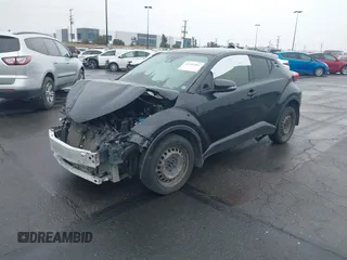 2021 Toyota C-HR LE with VIN JTNKHMBX9M1116943, listed as a IAAI auction lot 41369464 with Not Provided miles. Bid and sale history available at carsss.com. Image 2.
