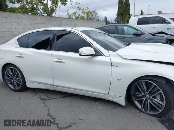 2015 Infiniti Q50 Premium with VIN JN1BV7AP1FM348389, listed as a IAAI auction lot 41754694 with 60,618 mi miles and . Bid and sale history available at DreamBid. Image 13.