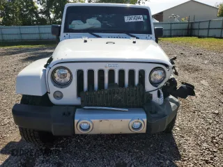 2018 Jeep Wrangler JK Unlimited Sahara with VIN 1C4HJWEG7JL910656, listed as a Copart auction lot 73414244 with 50,519 mi miles and Salvage Title. Bid and sale history available at carsss.com. Image 5.