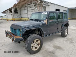 2008 Jeep Wrangler Unlimited Rubicon z VIN 1J4GA69128L529271, wystawiony jako Copart lot #58939945 z przebiegiem 94 503 mil mil oraz Szkoda całkowita • Salvage title. Historia ofert i sprzedaży dostępna na DreamBid. Obrazek 1.