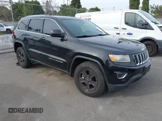 2016 Jeep Grand Cherokee Laredo z VIN 1C4RJEAG5GC383035, wystawiony jako IAAI lot #41058525 z przebiegiem 100 593 mil mil oraz . Historia ofert i sprzedaży dostępna na DreamBid. Obrazek 1.