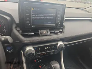 2022 Toyota RAV4 Hybrid XLE Premium with VIN 4T3B6RFV2NU084419, listed as a IAAI auction lot 42729518 with 76,607 mi miles and . Bid and sale history available at DreamBid. Image 13.