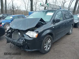 2014 Dodge Grand Caravan SXT with VIN 2C4RDGCG8ER257837, listed as a IAAI auction lot 41211629 with 139,231 mi miles and . Bid and sale history available at DreamBid. Image 6.