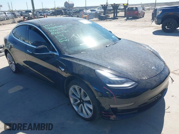 2020 Tesla Model 3 Standard Range Plus with VIN 5YJ3E1EAXLF614002, listed as a IAAI auction lot 41758898 with 42,363 mi miles and . Bid and sale history available at DreamBid. Image 1.