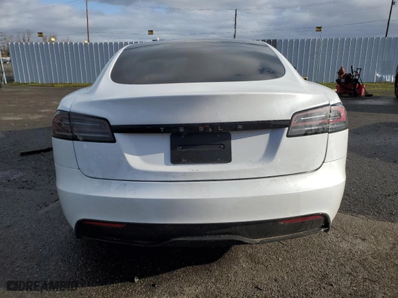 2024 Tesla Model S with VIN 5YJSA1E59RF541014, listed as a Copart auction lot 86646114 with 7,404 mi miles and Salvage Title. Bid and sale history available at carsss.com. Image 6.