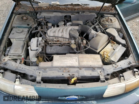 1995 Ford Taurus GL with VIN 1FALP52U8SA179395, listed as a Copart auction lot 53614265 with 71,082 mi miles and Salvage title. Bid and sale history available at DreamBid. Image 11.