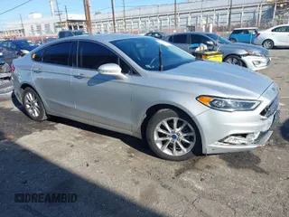 2017 Ford Fusion SE z VIN 3FA6P0HD4HR275658, wystawiony jako IAAI lot #41861241 z przebiegiem 124 885 mil mil oraz . Historia ofert i sprzedaży dostępna na DreamBid. Obrazek 1.