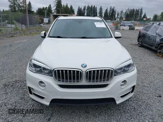 2016 BMW X5 xDrive40e z VIN 5UXKT0C55G0S77047, wystawiony jako IAAI lot #42224623 z przebiegiem 102 611 mil mil oraz . Historia ofert i sprzedaży dostępna na DreamBid. Obrazek 13.