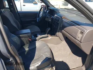 2001 Jeep Grand Cherokee Laredo with VIN 1J4GW48S31C550460, listed as a IAAI auction lot 42769410 with 261,640 mi miles and . Bid and sale history available at DreamBid. Image 5.