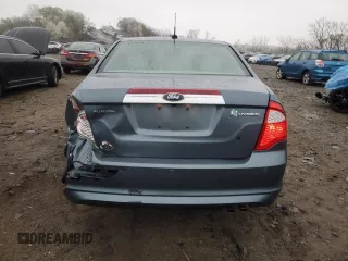 2012 Ford Fusion Hybrid z VIN 3FADP0L35CR425873, wystawiony jako Copart lot #50870905 z przebiegiem 75 133 mil mil oraz Szkoda całkowita • Salvage title. Historia ofert i sprzedaży dostępna na DreamBid. Obrazek 6.