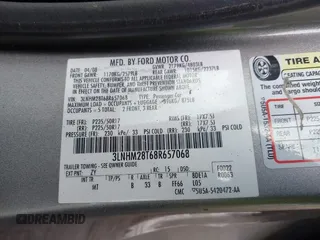 2008 Lincoln MKZ with VIN 3LNHM28T68R657068, listed as a IAAI auction lot 41431401 with 128,940 mi miles. Bid and sale history available at carsss.com. Image 9.