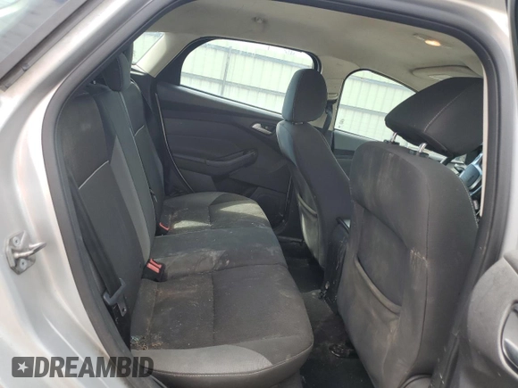 2014 Ford Focus SE z VIN 1FADP3K23EL379262, wystawiony jako Copart lot #54202305 z przebiegiem 144 237 mil mil oraz Szkoda całkowita • Salvage title. Historia ofert i sprzedaży dostępna na DreamBid. Obrazek 10.