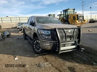 2021 Nissan Titan SV z VIN 1N6AA1FB9MN533034, wystawiony jako Copart lot #81335494 z przebiegiem 71 281 mil mil oraz Szkoda całkowita • Salvage title. Historia ofert i sprzedaży dostępna na DreamBid. Obrazek 11.