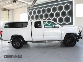 2021 Toyota Tacoma SR z VIN 3TYSZ5AN0MT009231, wystawiony jako Copart lot #59748295 z przebiegiem 37 912 mil mil oraz Szkoda całkowita • Salvage title. Historia ofert i sprzedaży dostępna na DreamBid. Obrazek 3.