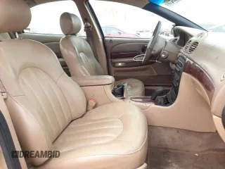 1999 Chrysler LHS z VIN 2C3HC56G0XH233303, wystawiony jako Copart lot #42642835 z przebiegiem 124 887 mil mil oraz Tytuł czysty. Historia ofert i sprzedaży dostępna na DreamBid. Obrazek 5.