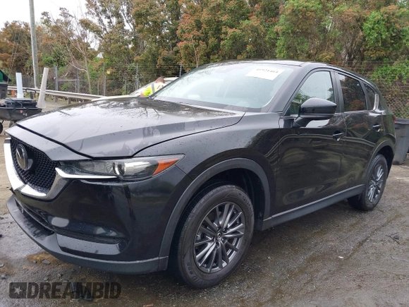 2020 Mazda CX-5 Touring with VIN JM3KFACM9L0770933, listed as a IAAI auction lot 41921464 with 75,997 mi miles. Bid and sale history available at carsss.com. Image 2.