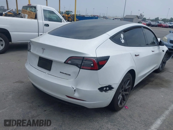 2023 Tesla Model 3 with VIN 5YJ3E1EA2PF417959, listed as a IAAI auction lot 42463853 with 22,736 mi miles and . Bid and sale history available at DreamBid. Image 4.