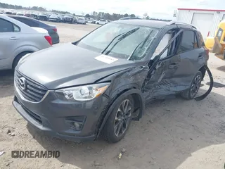 2016 Mazda CX-5 Grand Touring with VIN JM3KE4DY9G0845707, listed as a IAAI auction lot 41709685 with 96,351 mi miles. Bid and sale history available at carsss.com. Image 17.
