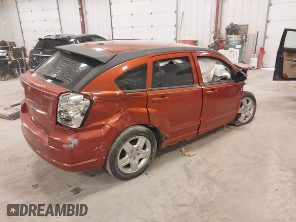 2009 Dodge Caliber SXT with VIN 1B3HB48A59D168273, listed as a IAAI auction lot 41988835 with 200,125 mi miles and . Bid and sale history available at DreamBid. Image 4.
