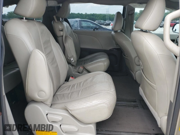 2011 Toyota Sienna XLE AAS с VIN 5TDYK3DC8BS106182, выставлен на аукционе Copart как лот 57728465 с пробегом 168 468 миль миль и Списание • Salvage title. История ставок и продаж доступна на DreamBid. Изображение 11.