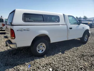 2004 Ford F-150 XL with VIN 2FTRF18W54CA36334, listed as a Copart auction lot 63464375 with 253,805 mi miles and Salvage title. Bid and sale history available at DreamBid. Image 3.