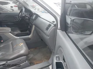 2003 Honda Pilot EX with VIN 2HKYF18533H604995, listed as a IAAI auction lot 41936058 with 205,848 mi miles. Bid and sale history available at carsss.com. Image 5.