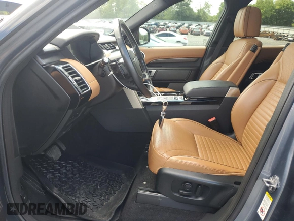 2018 Land Rover Discovery HSE Luxury with VIN SALRT2RV5JA075290, listed as a Copart auction lot 68240464 with 76,647 mi miles and Salvage Title. Bid and sale history available at carsss.com. Image 7.