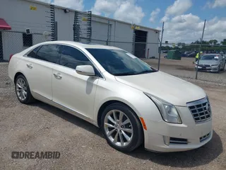 2013 Cadillac XTS Luxury with VIN 2G61P5S34D9138319, listed as a IAAI auction lot 42626756 with 88,743 mi miles and . Bid and sale history available at DreamBid. Image 1.