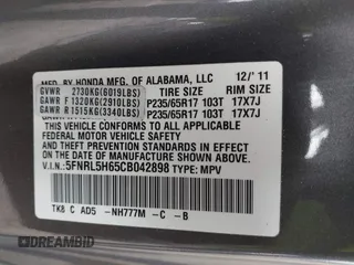 2012 Honda Odyssey EX-L with VIN 5FNRL5H65CB042898, listed as a IAAI auction lot 41784075 with 179,596 mi miles and . Bid and sale history available at carsss.com. Image 9.