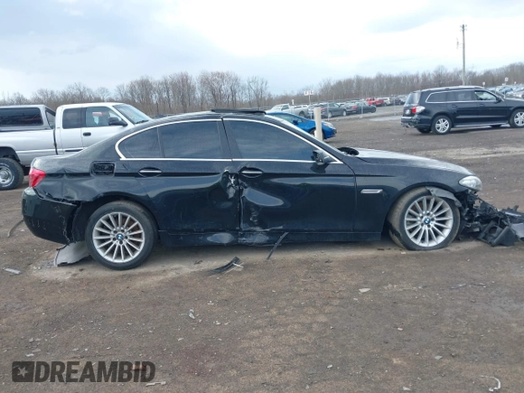 2014 BMW 5 Series 528i xDrive with VIN WBA5A7C56ED612168, listed as a IAAI auction lot 41746600 with 115,117 mi miles and . Bid and sale history available at DreamBid. Image 12.