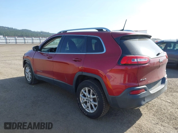 2016 Jeep Cherokee Latitude with VIN 1C4PJMCS8GW250318, listed as a IAAI auction lot 42126241 with 105,028 mi miles. Bid and sale history available at carsss.com. Image 3.