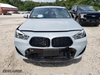 2021 BMW X2 xDrive28i with VIN WBXYJ1C04M5S67817, listed as a Copart auction lot 68214304 with 54,454 mi miles and Salvage Title. Bid and sale history available at carsss.com. Image 5.