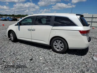 2014 Honda Odyssey EX-L with VIN 5FNRL5H63EB101062, listed as a Copart auction lot 56656825 with 183,871 mi miles and Salvage title. Bid and sale history available at DreamBid. Image 2.
