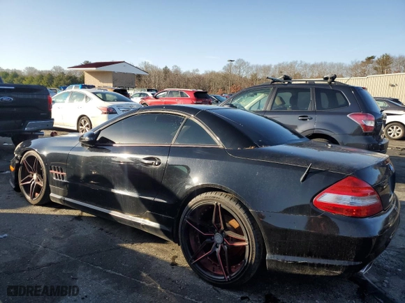 2009 Mercedes-Benz SL-Class V8 with VIN WDBSK71FX9F153802, listed as a Copart auction lot 83872604 with 0 mi miles and Salvage Title. Bid and sale history available at carsss.com. Image 2.