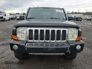 2010 Jeep Commander Limited with VIN 1J4RG5GT4AC146847, listed as a Copart auction lot 50259965 with 114,894 mi miles and Salvage title. Bid and sale history available at DreamBid. Image 5.