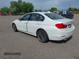 2013 BMW 3 Series 328i xDrive with VIN WBA3B5C52DF599074, listed as a IAAI auction lot 42408547 with 158,050 mi miles and . Bid and sale history available at DreamBid. Image 3.
