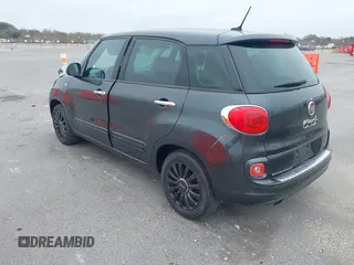 2014 FIAT 500L Easy with VIN ZFBCFABH1EZ011485, listed as a IAAI auction lot 41598470 with 69,036 mi miles and . Bid and sale history available at DreamBid. Image 3.