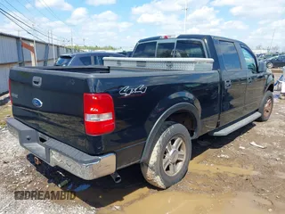 2007 Ford F-150 XLT with VIN 1FTPW14V67KC70678, listed as a IAAI auction lot 42002237 with 309,291 mi miles. Bid and sale history available at carsss.com. Image 4.