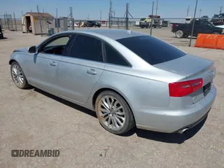 2013 Audi A6 Premium Plus with VIN WAUDFAFCXDN051423, listed as a IAAI auction lot 42249789 with 124,372 mi miles and . Bid and sale history available at DreamBid. Image 3.